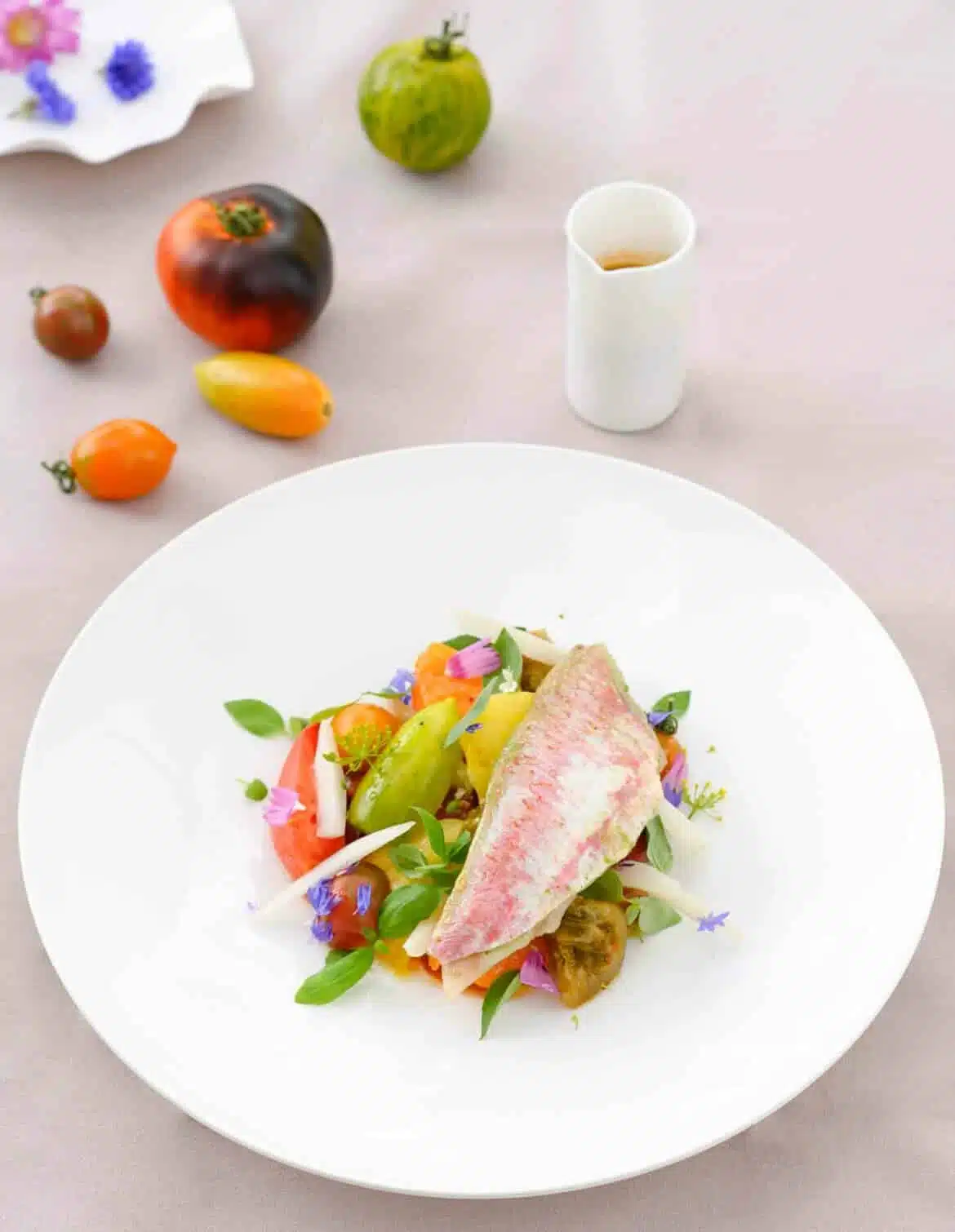Red mullet fillets with pesto, tomatoes, pickled fennel and flavoured broth by Jérémmy Parjouet